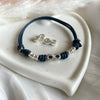 B0246 Bracciale in cordino cerato con simbolo infinto e rondelle