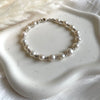 B0193 Bracciale argento rondelle mini e perle di fiume a sassolino