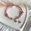 B0270 Bracciale in cordino cerato con granelli e cuore pendente
