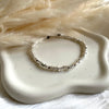 B0302 Bracciale con rondelle irregolari martellate piccole lisce