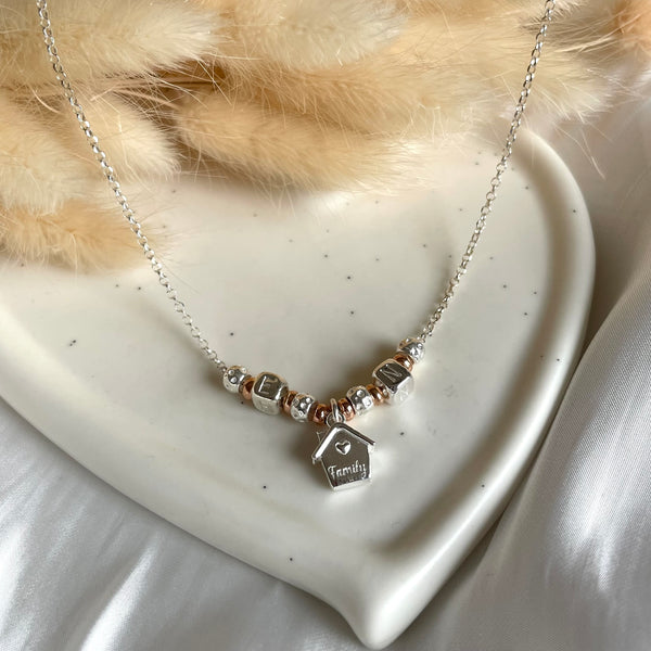 CL0145 Collana rolò in argento con iniziali cubo e casina Family pendente