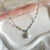 CL0175 Collana rosario colori pastello e ciondolo fiore pendente “grazie maestra”