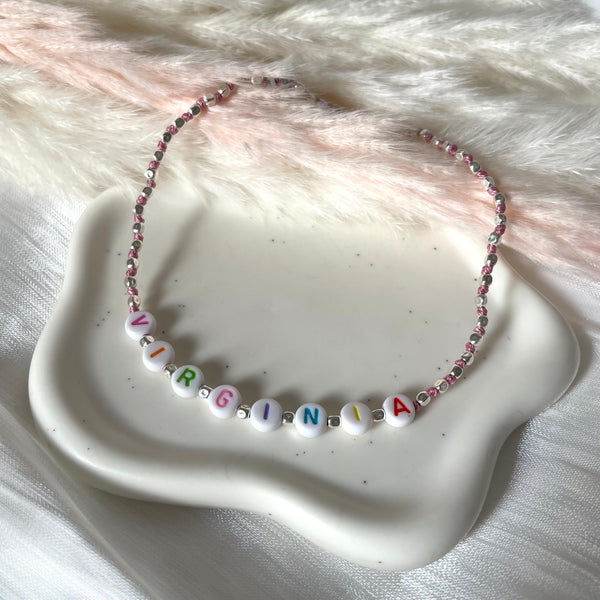 CL0167 Collana baby argento con pepite mini e nodi in filo nautico colorato con iniziali