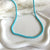 CL0168 Collana in argento con palline pasta turchese