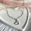 CL0169 Collana rosario colori pastello e ciondolo cuore vuoto