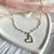 CL0169 Collana rosario colori pastello e ciondolo cuore vuoto