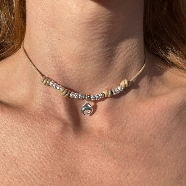 CL031 Necklace with waxed cord and tortellino pendant