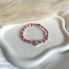 B0306 Bracciale baby con nodi, pepite piccole e puzzle passante