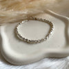 B0303 Bracciale con rondelle irregolari martellate piccole martellate