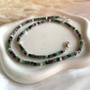 CL110 Collana con cubetti sfaccettati di rubino zoisite e rondelle martellate in argento