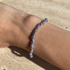 B082 Bracciale con palline piccole alternate a nodini in filo nautico