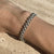 B066 Bracciale intreccio con palline rigate