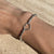 B055 Bracciale con pepite martellate e rondellina con cuore vuoto piccolo centrale