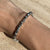 B018 Bracciale borchie e intrecci