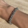 B065 Bracciale intreccio con pepite martellate e rondelle