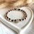B0197 Bracciale con nodi in filo nautico e casina family passante