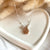 CL123 Collana palline alternate in argento con casina Family pendente
