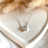 CL122 Collana rolò in argento con casina Family passante
