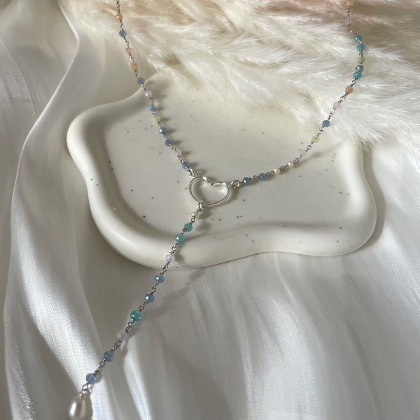 CL0165 Collana rosario con pietre multicolor pastello e cuore al centro