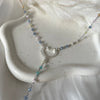 CL0165 Collana rosario con pietre multicolor pastello e cuore al centro