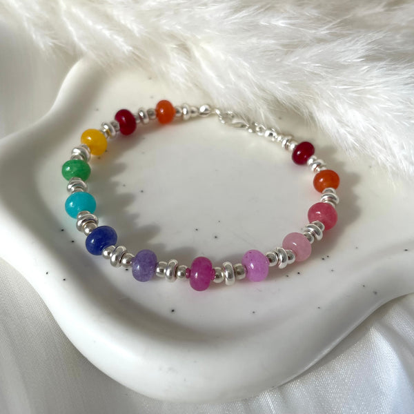B0252 Bracciale candy con rondelle arcobaleno, palline e rondelle argento