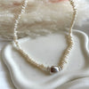 CL106 Collana con perle di fiume taglio conchiglia e pepitone centrale argento