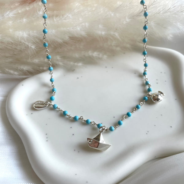 CL0181 Collana rosario in pasta di turchese e ciondoli: pesce, barca e conchiglia