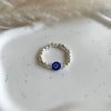 A024 Anello elasticizzato pepite mini occhio turco portafortuna