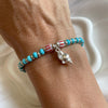 B0284 Bracciale con rondelle sfaccettate in aulite, argento e ciondolo conchiglia.