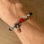 N006 Bracciale cordino cerato con cuore passante e renna