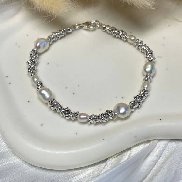 B0189 Bracciale con nodini piccoli argento e perle di fiume
