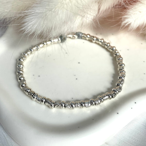 B034 Bracciale granelli piccoli e rondelle