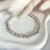 B059 Bracciale con pepite lisce