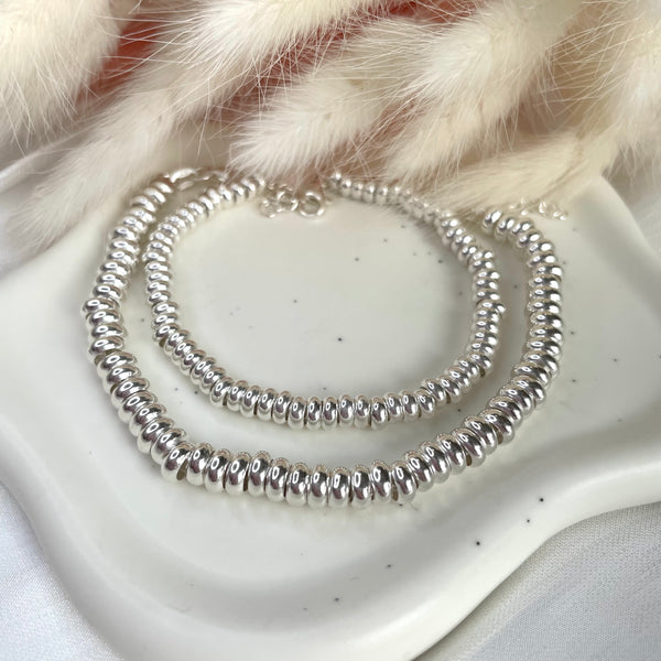 B075 Bracciale con rondelle