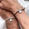 B166 Bracciale di coppia in cordino cerato con granelli nuovi+ iniziali e puzzle al centro