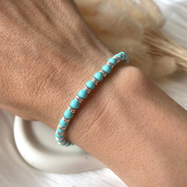 B086 Bracciale con palline in pasta di turchese intervallata da due anelline