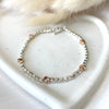 B123 Bracciale pepite mini con cuori passanti rosati