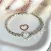 B055 Bracciale con pepite martellate e rondellina con cuore vuoto piccolo centrale bianco o rosato