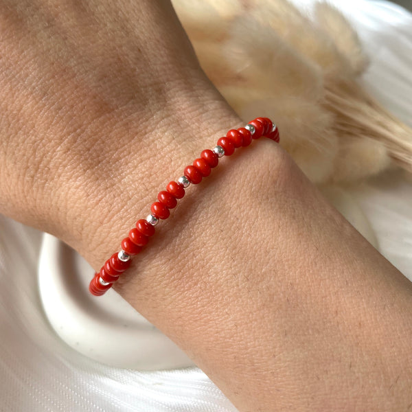 B0165 Bracciale con rondelle corallo e palline argento