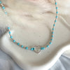 CL082 Collana in pasta di turchese e palline argento con cuore centrale vuoto