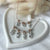 CL070 Family Necklace with Family First Charms and New Grains