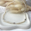 CL089 Collana con perle di fiume e mini cuori