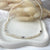 CL089 Collana con perle di fiume e mini cuori